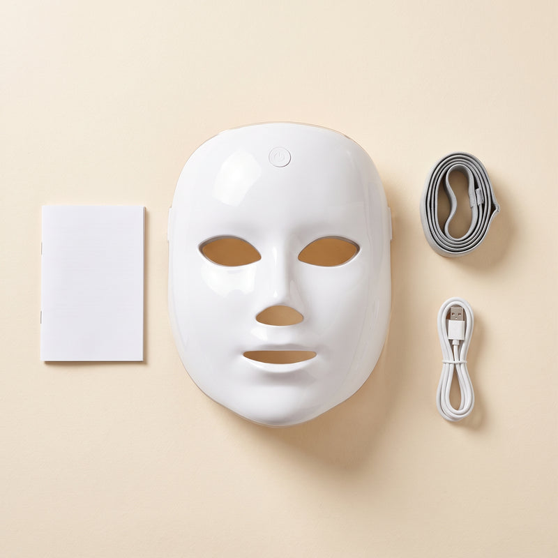 Contenu du LumiMask : masque, sangle réglable, câble USB-C et notice
